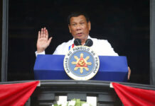 Duterte Pressed to Assert 2016 Arbitration Victory Vs China Philippine President Rodrigo Duterte gestures while addressing the crowd after leading the flag-raising rites at the 120th Philippine Independence Day celebration in June at the Emilio Aguinaldo Shrine at Kawit, Cavite province south of Manila, Philippines. Photo: Bullit Marquez / Associated Press