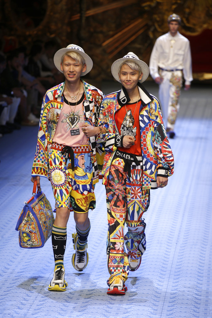 Models wear creations as part of Dolce & Gabbana's men's 2019 Spring-Summer collection, unveiled during the Fashion Week in Milan, Italy, on Saturday.