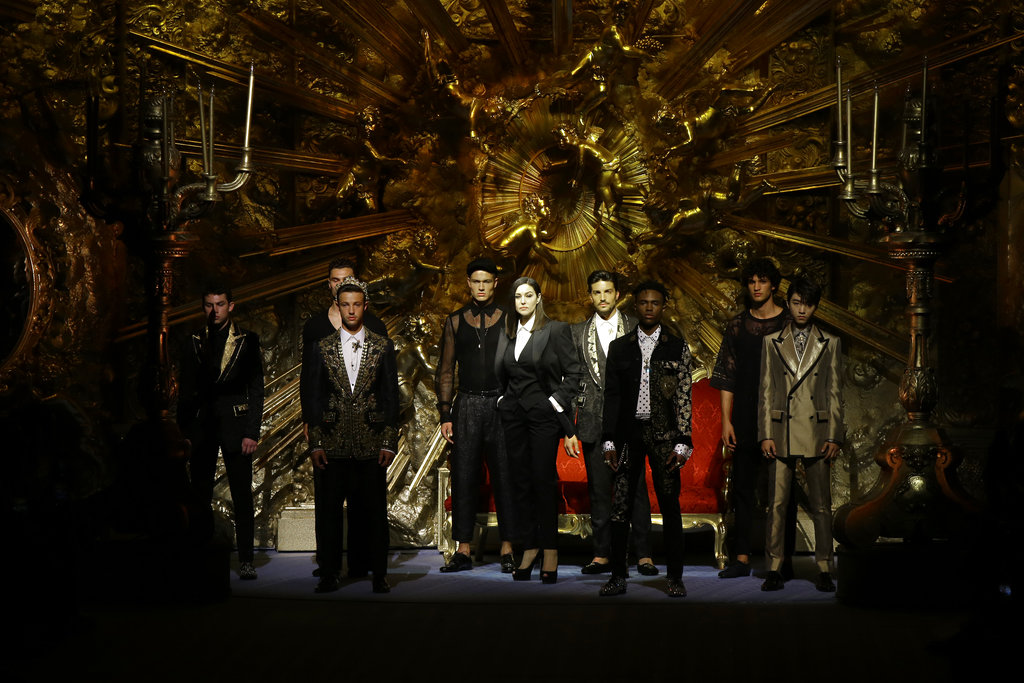 Actress Monica Bellucci, centre, wears a creation as she stands with other models at the Dolce &Gabb ana's 2019 Spring-Summer collection.