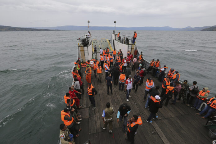 Indonesia Ferry Sinks Rescuers Tuesday searching for dozens of people missing after a ferry sank on Indonesia's Lake Toba have found bags, jackets, an ID card and other items in the waters but no new survivors, casting a tragic pall over holidays marking the end of the Muslim holy month. Photo: Associated Press