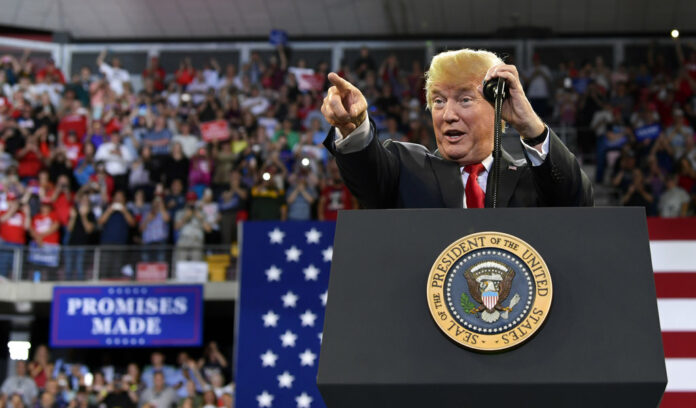 President Donald Trump speaks at a rally at AMSOIL Arena in Duluth, Minn. Photo : Susan Walsh / Associated Press