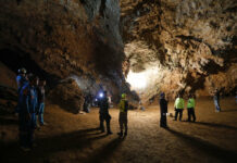 Power Line Put in Chiang Rai Cave to Help Find Missing Boys Rescue teams gather Monday in a deep cave where a group of boys went missing in Chang Rai. Photo: Krit Promsakla Na Sakolnakorn / Thai News Pix / AP