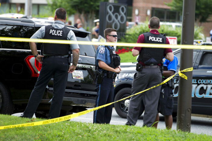 Shootings Newspaper Authorities work the scene after multiple people were shot at a newspaper office building in Annapolis, Md., Thursday, June 28, 2018. Photo: Jose Luis Magana / Associated Press