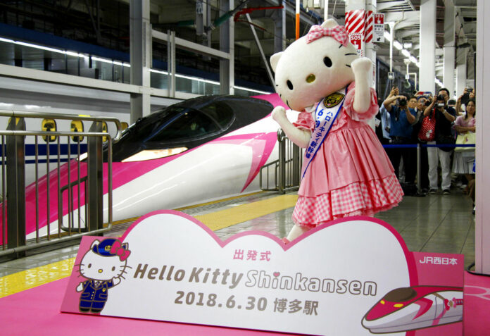 A Hello Kitty-themed “shinkansen” bullet train is unveiled Saturday at JR Shin Osaka station, in Osaka, western Japan. Photo: Kyodo News via AP