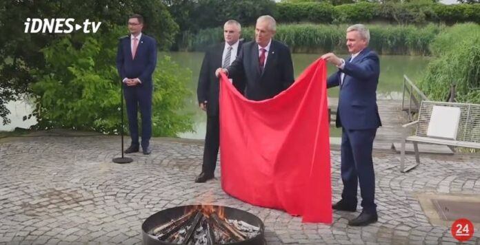 Czech President Milos Zeman had two firefighters ceremoniously burn a giant pair of underpants at a press briefing on Friday. Photo: iDNEStv