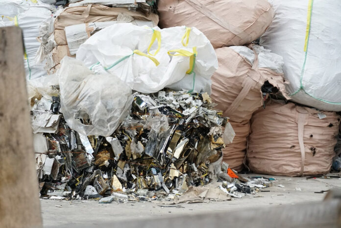 E-waste at the JW Metal Recovery Intergroup Co. Ltd. facility June 13, 2018 in Pathum Thani, accused of illegally importing foreign waste. E-waste at the JW Metal Recovery Intergroup Co. Ltd. facility June 13, 2018 in Pathum Thani, accused of illegally importing foreign waste.