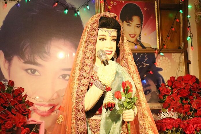 A doll in the likeness of Pumpuang Duangjan Wednesday night at Wat Thap Kradan.