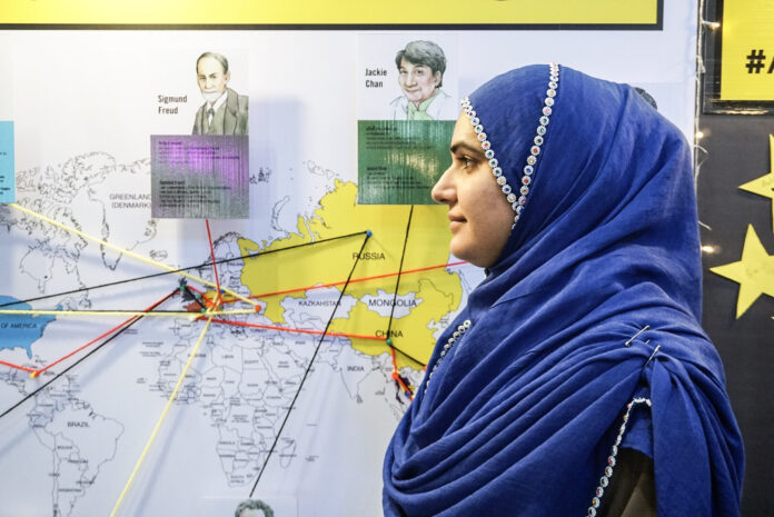 A Pakistani refugee identified only as A.S. visits an Amnesty International Thailand event Saturday at Siam Square One. A Pakistani refugee identified only as A.S. visits an Amnesty International Thailand event Saturday at Siam Square One.