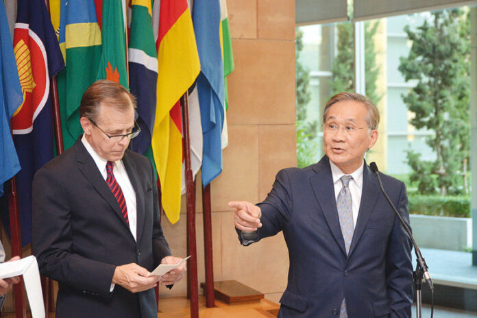 Foreign Affairs Minister Don Pramudwinai, right, gestures to reporters May 12, 2016, during a joint news conference with US ambassador Glyn Davies.