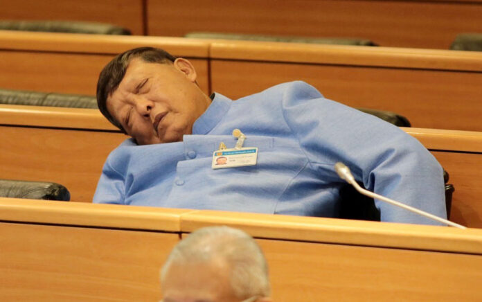 Air Chief Marshal Chalee Chanruang sleeps during Thursday’s budget meeting.