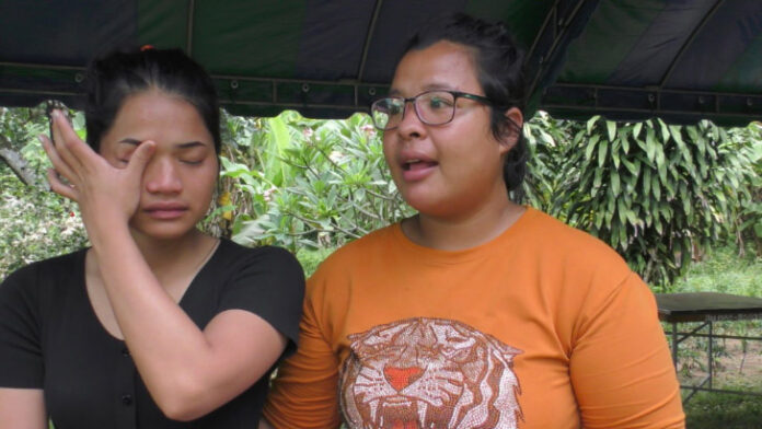 Kanita Longji, 20, at her family home in Trang province, speaks about last night's execution of her older brother, Teerasak Longji. Photo: Matichon