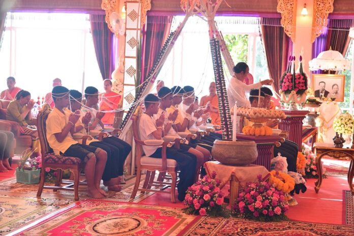 The Wild Boars football team attends a religious ceremony Thursday in Chiang Rai province.