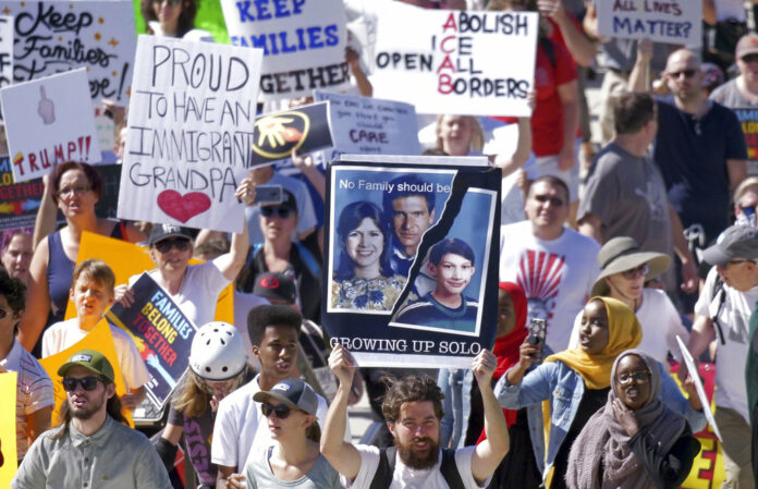 Activists, including one holding a 