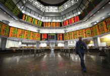 Asian Markets Rising After Corporate Gains Boost Wall Street Photo : Vincent Thian / Associated Press