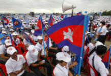 US Firm: Chinese Hackers Infiltrate Cambodia Ahead of Polls Supporters wait for the start of a campaign rally of Cambodian Prime Minister Hun Sen's Cambodian People's Party on Saturday in Phnom Penh, Cambodia. Photo: Heng Sinith / Associated Press