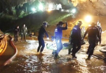 9 Australians Awarded Bravery Medals for Luang Cave Rescue In this undated file image from video released July 11, rescuers hold an evacuated boy inside the Tham Luang Nang Non cave in Mae Sai, Chiang Rai province. Photo: Associated Press
