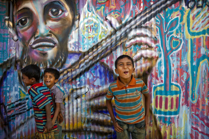 Rohingya refugee children play outside their makeshift school in January in the Kutupalong refugee camp near Cox's bazar, Bangladesh. Photo: Manish Swarup / Associated Press