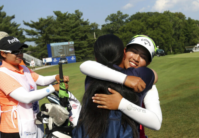 Thidapa Suwannapura is embraced after her win in the LPGA golf Marathon Classic Sunday, July 15, 2018, at Highland Meadows in Sylvania, Ohio. Photo: Katie Rausch / Associated Press