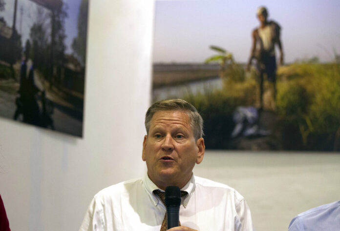 Phil Robertson, deputy Asia director at Human Rights Watch, talks to journalists during a press briefing on a project titled 