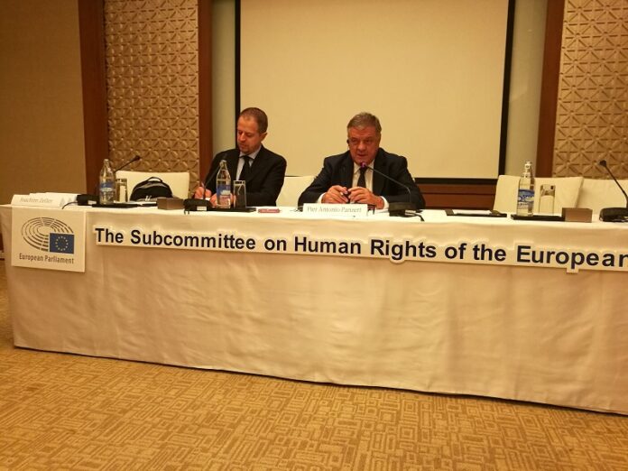 Pier Antonio Panzeri, right, chairman of the European Parliament’s Human Rights subcommittee, speaks Wednesday at a press conference in Bangkok.