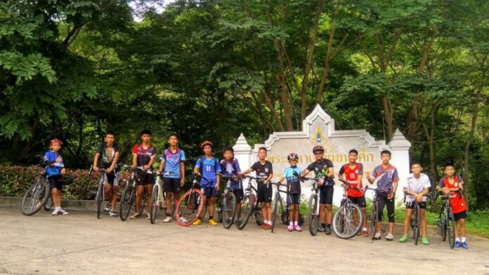 A photo of the 12 young footballers and their coach provided by the authorities.
