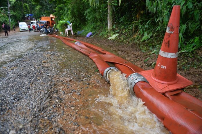 Water pumped out from Tham Luang Nang Non. June 1