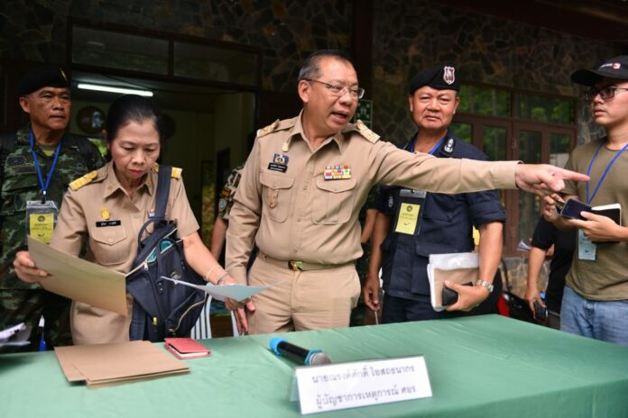 Chiang Rai Gov. Narongsak Osottanakorn gestures to reporters Monday.