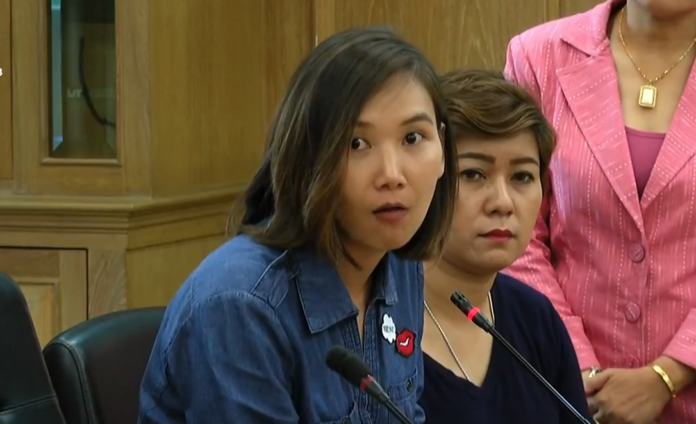 Rungroj Khwunkomol, aunt of the assaulted student, speaks at a press conference Friday afternoon.