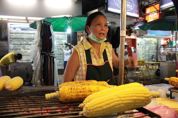Saowalak Unkaew at her grilled corn cart in Khaosan Road Tuesday night.