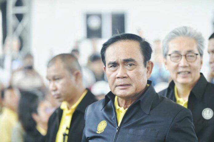 Gen. Prayuth Chan-ocha with members of his cabinet July 24 in Ubon Ratchathani province.