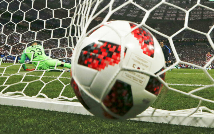 Croatia goalkeeper Danijel Subasic fails to stop France's Antoine Griezmann from scoring from the penalty spot his side's second goal during the final match between France and Croatia at the 2018 soccer World Cup on Sunday in the Luzhniki Stadium in Moscow. Photo: Natacha Pisarenko / Associated Press