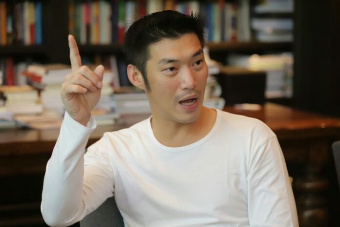 Thanathorn Juangroongruangkit sits for an interview in August at his southeastern Bangkok home.