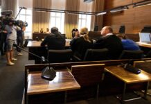 German Couple Convicted of Rape, Online Sale of Young Son Photographers take pictures of the a man and a woman in the court Tuesday in Freiburg, southern Germany. Photo: Patrick Seeger / Associated Press