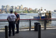 Police: Dad of Baby Found Floating in River Returned to US Authorities Sunday investigate the death of a baby boy who was found floating in the East River near the Brooklyn Bridge in Manhattan in New York. Photo: Robert Bumsted / Associated Press