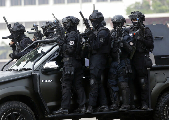Members of joint Indonesian police and military special forces take part in an anti-terrorism drill on July 25, 2018, ahead of the 2018 Asian Games in Jakarta, Indonesia. Photo: Tatan Syuflana/ Associated Press
