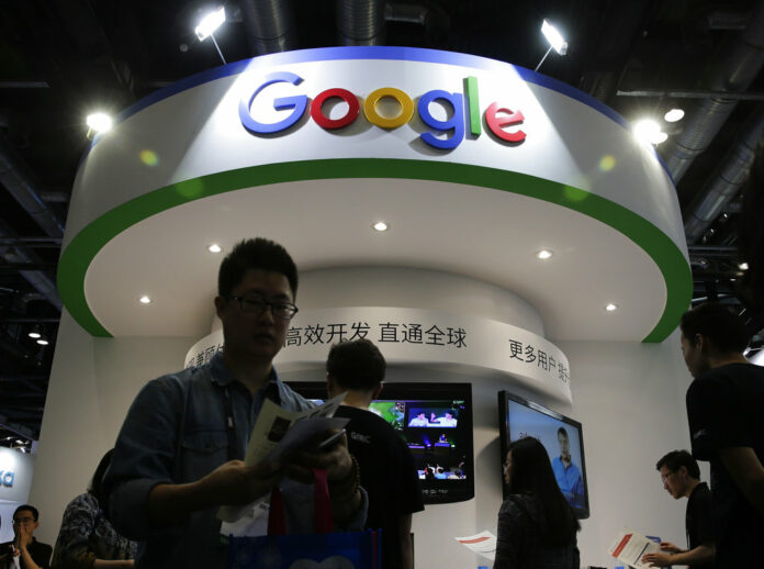 Visitors gather at a display booth for Google at the 2016 Global Mobile Internet Conference (GMIC) in Beijing. Photo: Andy Wong / Associated Press Visitors gather at a display booth for Google at the 2016 Global Mobile Internet Conference (GMIC) in Beijing. Photo: Andy Wong / Associated Press