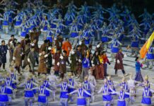 Bhutan: No Medals Yet in Asian Games – But Still Happy The Bhutan team marches into the Gelora Bung Karno Stadium Saturday during the opening ceremony for the 18th Asian Games , Jakarta, Indonesia. Photo: Firdia Lisnawati / Associated Press