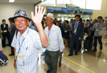 South Koreans Enter North to Reunite With Kin Split by War South Koreans leave for North Korea to take part in family reunions with their North Korean family members Monday at the customs, immigration and quarantine (CIQ) office, in Goseong, South Korea. Photo: Associated Press