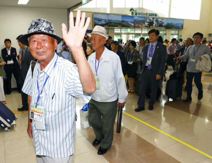 South Koreans leave for North Korea to take part in family reunions with their North Korean family members Monday at the customs, immigration and quarantine (CIQ) office, in Goseong, South Korea. Photo: Associated Press