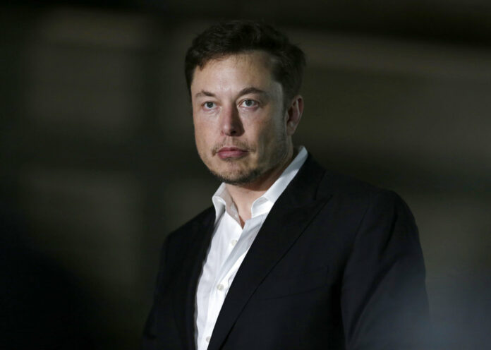 Tesla CEO and founder of the Boring Company Elon Musk speaks at a news conference in June in Chicago. Photo: Kiichiro Sato / Associated Press