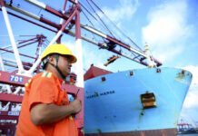 China Struggles to Curb Its Reliance on US Buyers, Suppliers A worker stands near a container ship Aug. 8 at a port in Qingdao in eastern China's Shandong Province. Photo: Associated Press