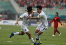 Son’s Last Shot for Military Exemption at Asian Games South Korea's Lee Seung-woo, left, celebrates his goal with teammate Son Heung-min Wednesday after scoring during their men's semifinal soccer match against Vietnam at the 18th Asian Games in Bogor, West Java, Indonesia. Photo: Lee Jin-man / Associated Press