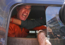 Cambodia Pardons Australian Filmmaker Convicted of Espionage Australian filmmaker James Ricketson speaks from a prisoner van outside Phnom Penh Municipal Court last month in Phnom Penh, Cambodia. Photo: Heng Sinith / Associated Press