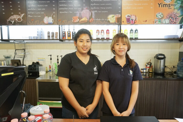 Kanyaporn Soongcharoen and Kanlayarak Aua-anantchai at a new branch of Yimsoo Cafe at Thammasat University, Tha Prachan campus.