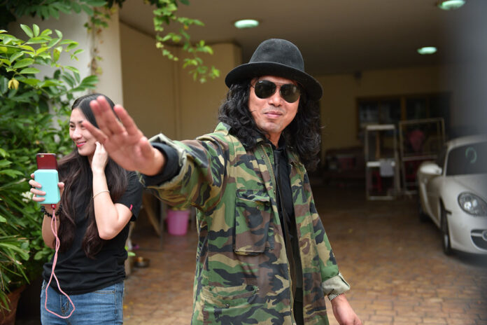 Seksan Sukpimai, aka Sek Loso, in front of his house Thursday.