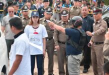 Phuket Club Owner Confesses to Double Murder: Police Panya ‘Siya Ouan’ Yingdang participates in a police ‘re-enactment’ Wednesday of the double murder in front of the Buddha Mountain in Chonburi province.