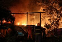 Fire Ravages Bangkok Sport Officials Homes Firefighters at the scene of fire Monday morning in Bangkok’s Bang Kapi district.