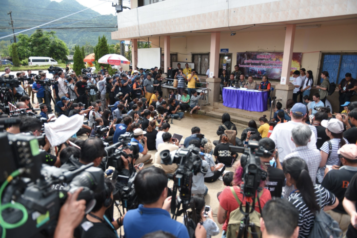 Officials face a massive media presence at a news conference held just after the operation got underway to rescue 12 boys and their coach from a cave last month in Chiang Rai province.