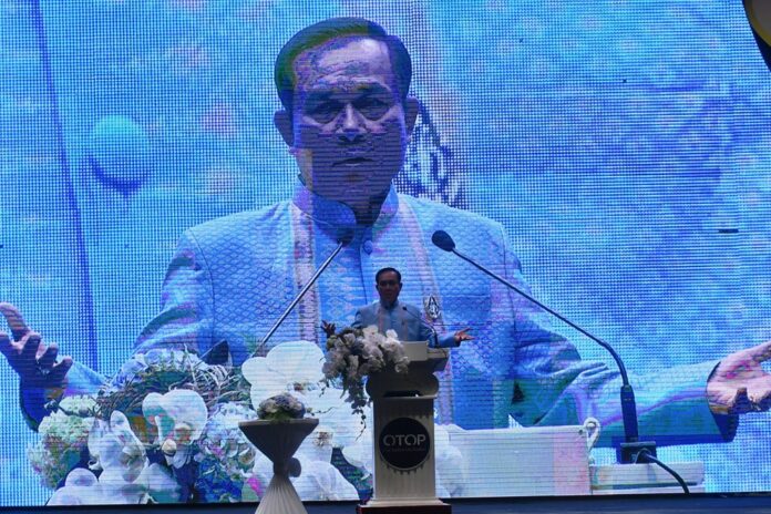PM Prayuth Chan-ocha speaks earlier this month at a convention in Bangkok.