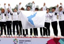 For First Time Since War, Gold Goes to Korea Members of combined Koreas team celebrate their victory during the ceremony for women's 500-meter dragon boat Sunday at the 18th Asian Games in Palembang, Indonesia. Photo: Kim Do-hun / Yonhap via AP